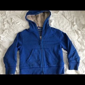 Blue, fleece-lined toddler hoodie.